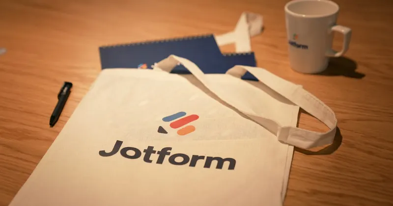 a white bag sitting on top of a wooden table